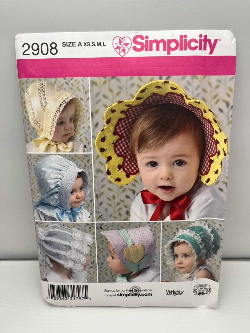 Simplicity Yellow and Red Floral Baby Sunbonnet Sewing Pattern